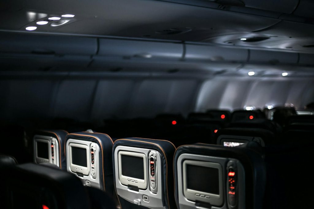 Airplane cabin seats, the kind of flight that earns or does not earn Tier Points