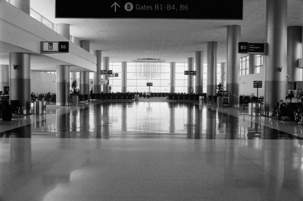 Delta Original Routing Credit: How to Get Miles and MQDs After Being Rebooked 3 Airport gate waiting area where a rebooked passenger might end up