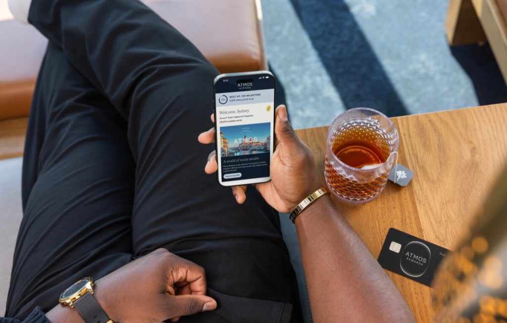 How Atmos Rewards Status Points Work: Redeemable Points vs. Status Points 3 Atmos Rewards app screen showing available points balance and status points milestone progress