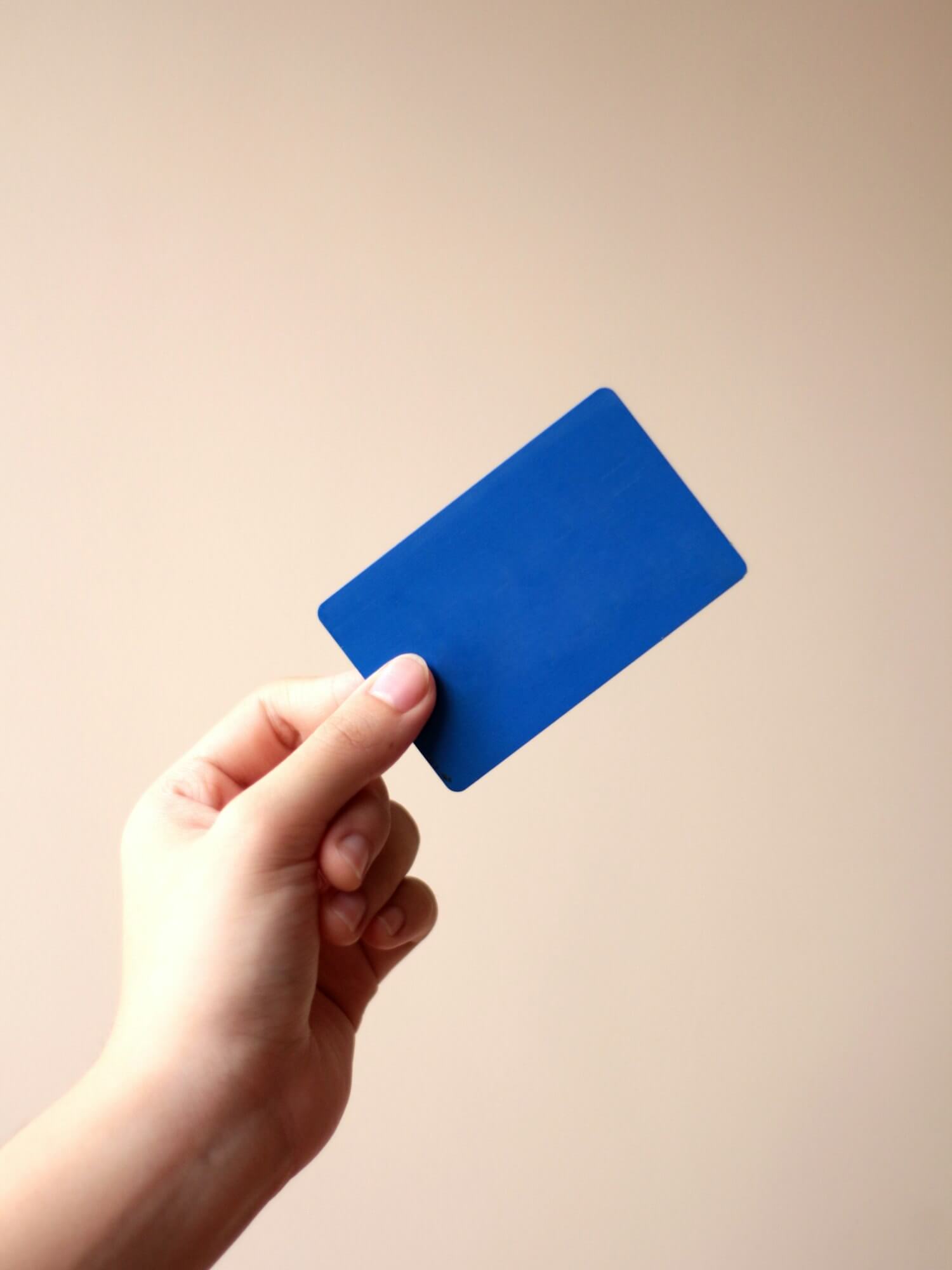 Choice Privileges Transfer Partners: Amex, Capital One & Wells Fargo 6 Hand holding a credit card, representing a points transfer to Choice Privileges