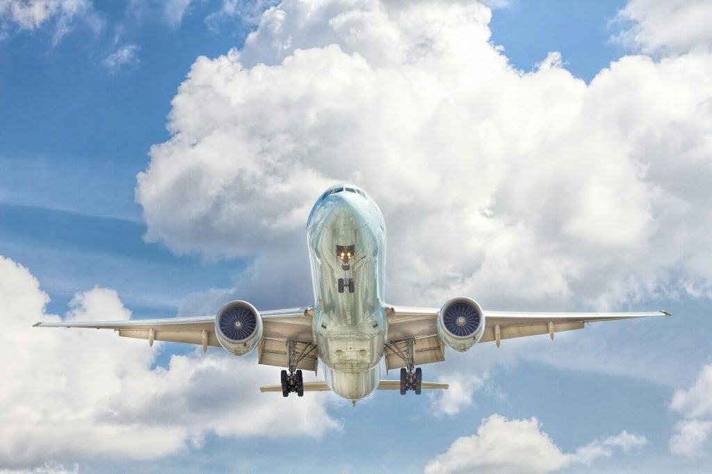 Delta Buy SkyMiles At Up To 50% Bonus Until September 30, 2026 15 Airplane in flight against a blue sky with clouds