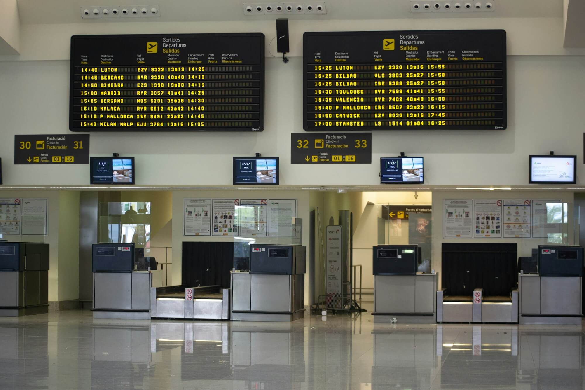 Airport departure board showing flight information