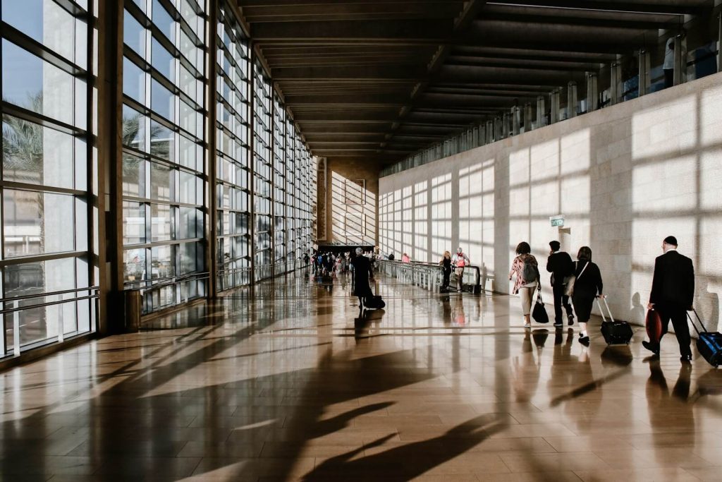Delta Ticket Number 006 Explained 12 Airport terminal corridor with travelers