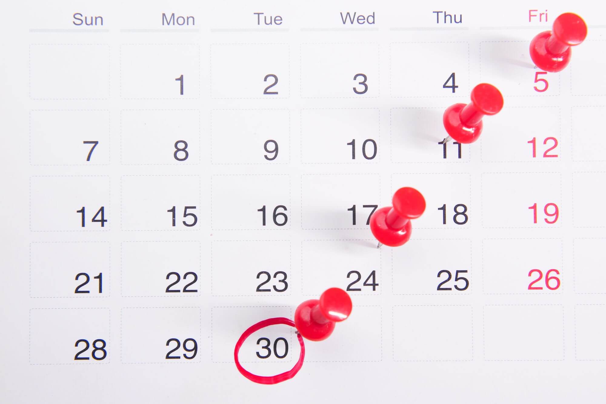 AwardWallet Paywalls Expiration Alerts on Its Free Tier 1 Calendar with red pins marking upcoming dates