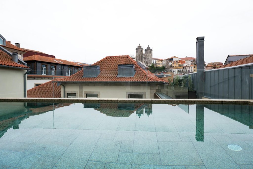 Marriott Platinum Soft Landing: Can You Drop to Gold? 6 Hotel rooftop pool overlooking a historic city skyline