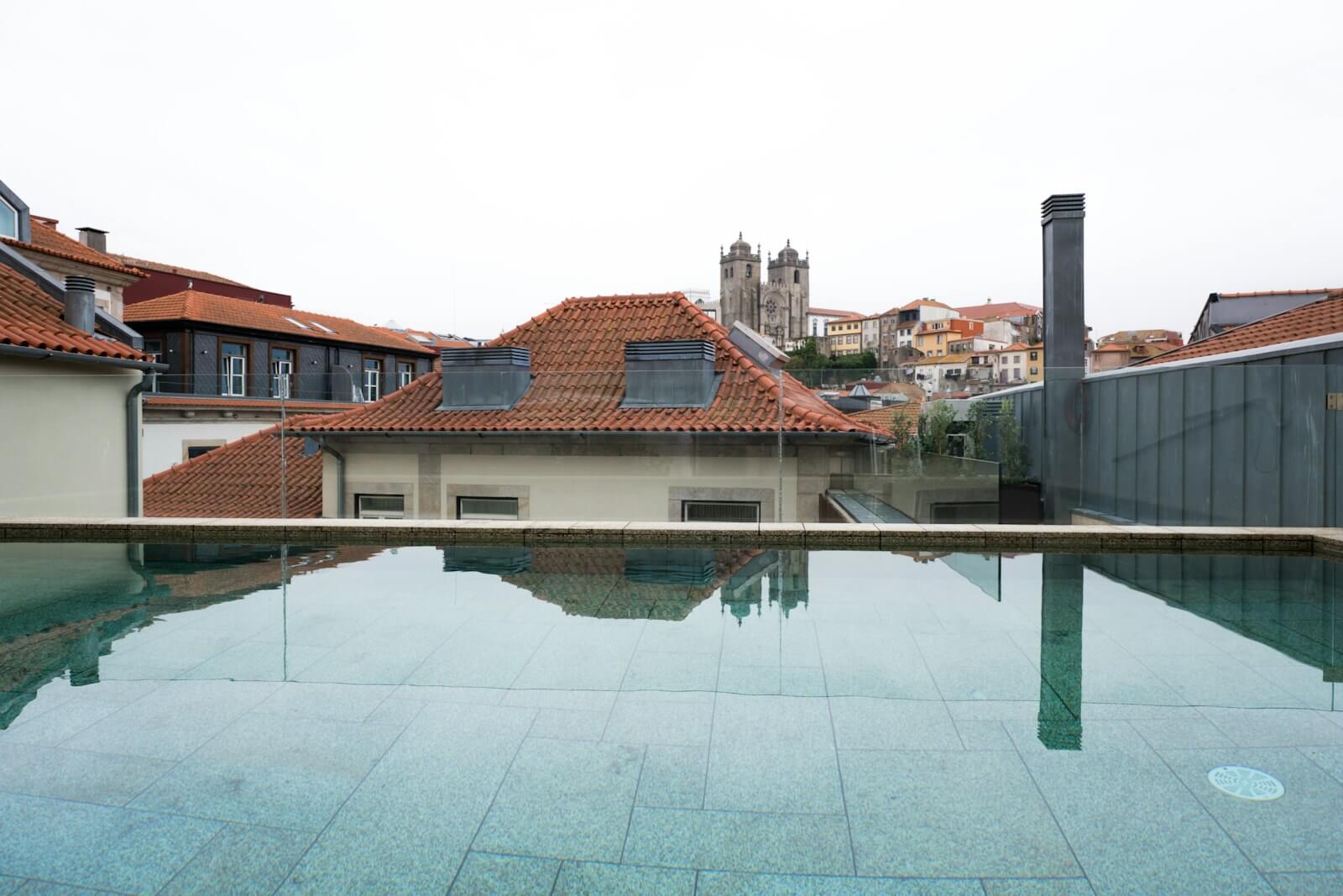 Marriott Platinum Soft Landing: Can You Drop to Gold? 1 Hotel rooftop pool overlooking a historic city skyline