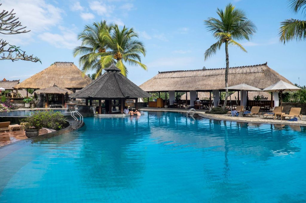 Wyndham Rewards Expands to a Four-Tier Award Chart, Adds 45,000-Point Ceiling 10 Tropical resort pool with thatched-roof cabanas