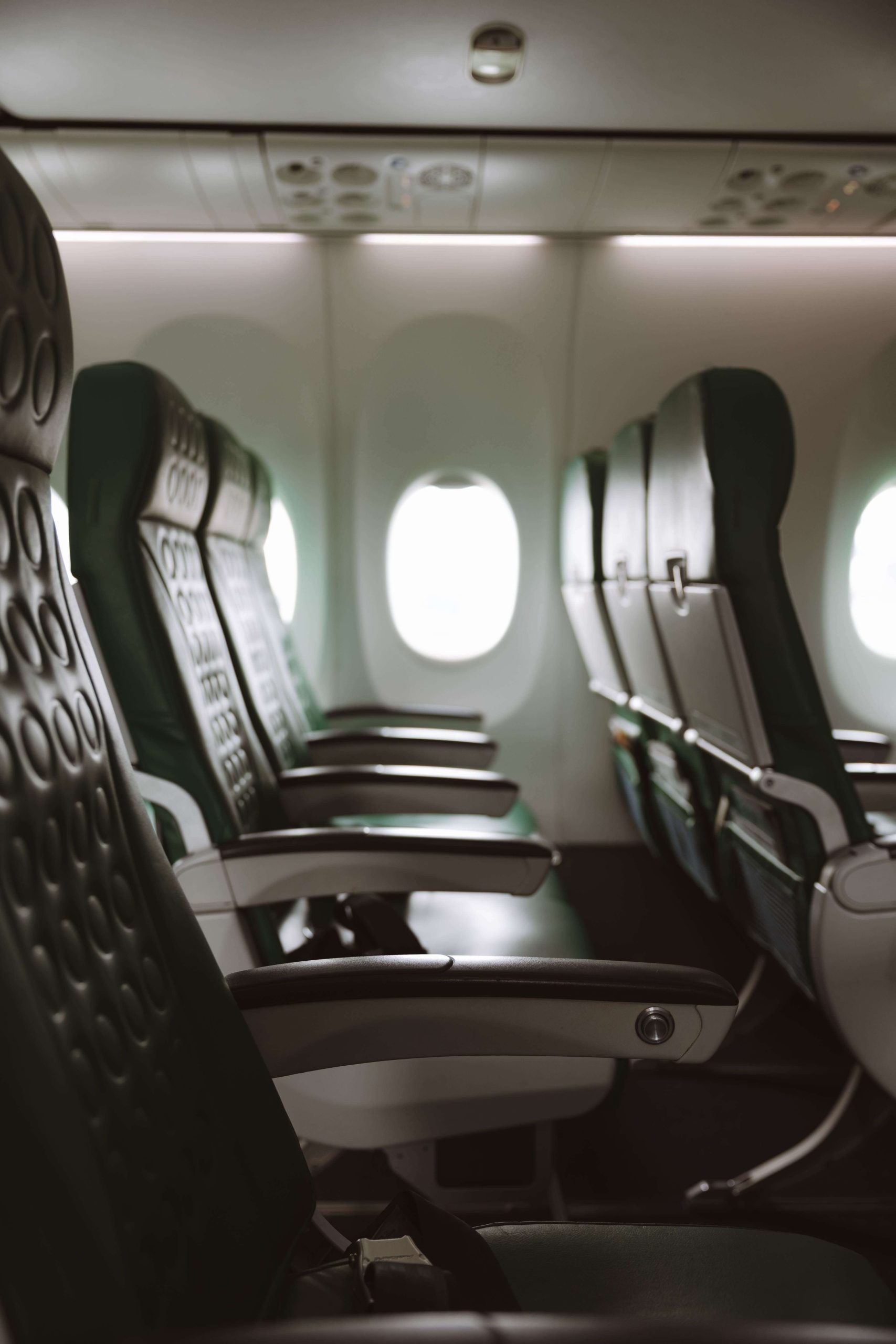 Chase Points Boost Explained: Rates, Timeline, and How to Use It 5 Rows of empty airplane cabin seats with window light