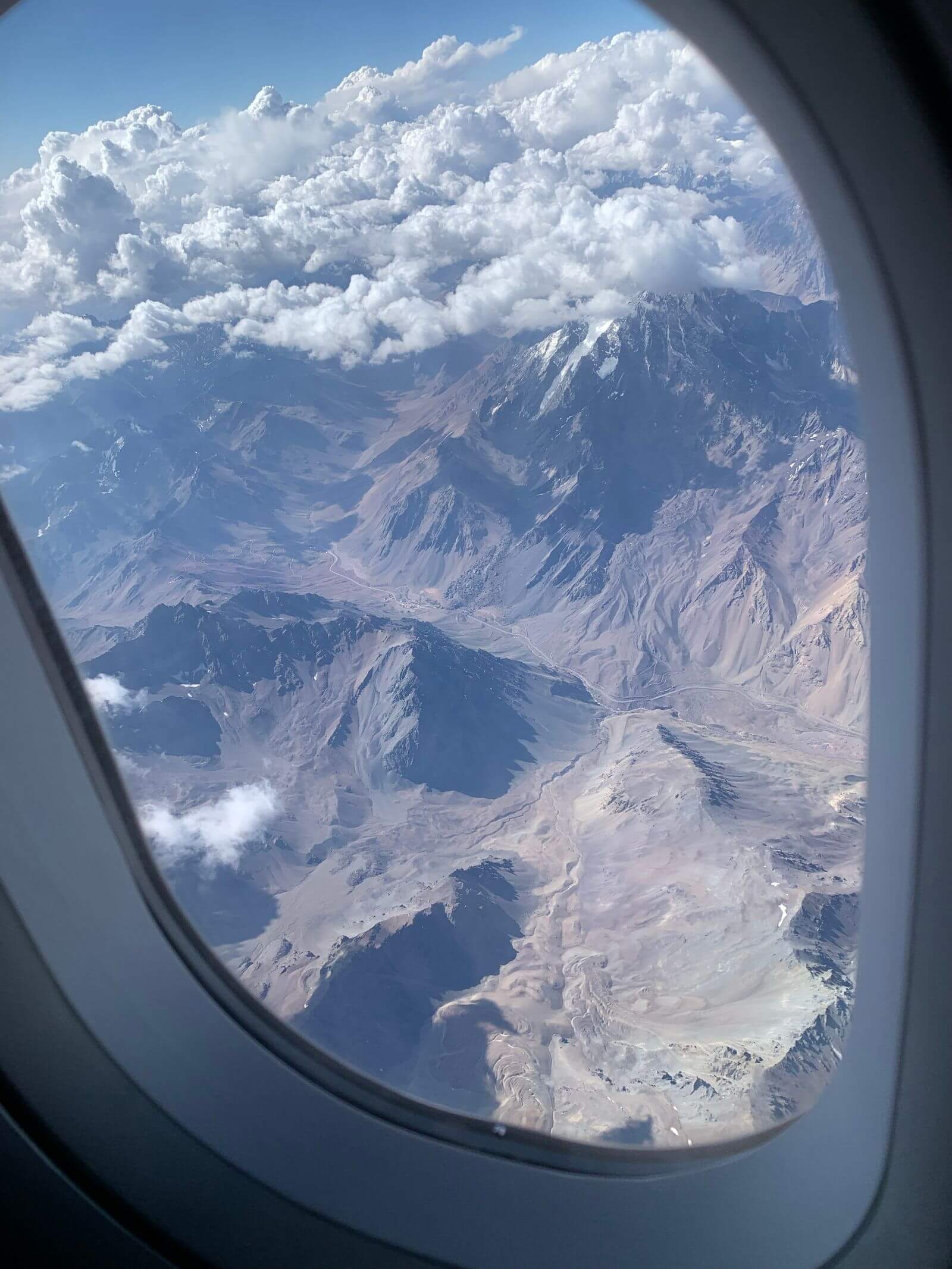 Atmos Rewards Business Visa Review: Is the Low Fee Worth It? 7 Mountain range seen from an airplane window