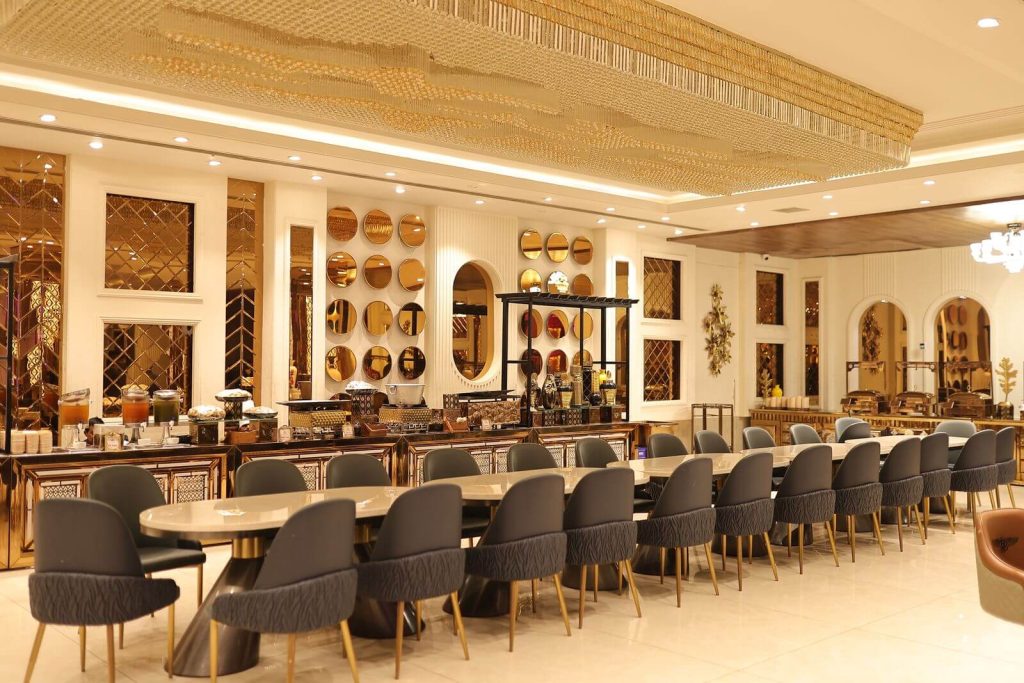 Delta SkyMiles Reserve Business Card Review: Is the $650 Fee Worth It? 6 Upscale lounge dining area with elegant seating