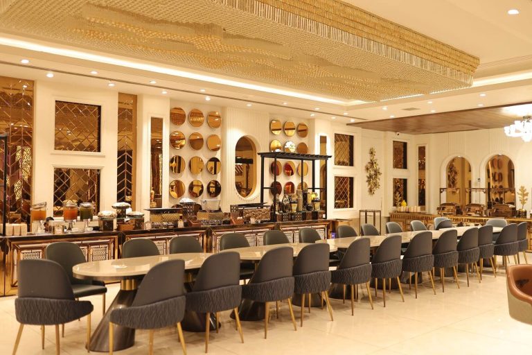Delta SkyMiles Reserve Business Card Review: Is the $650 Fee Worth It? 7 Upscale lounge dining area with elegant seating