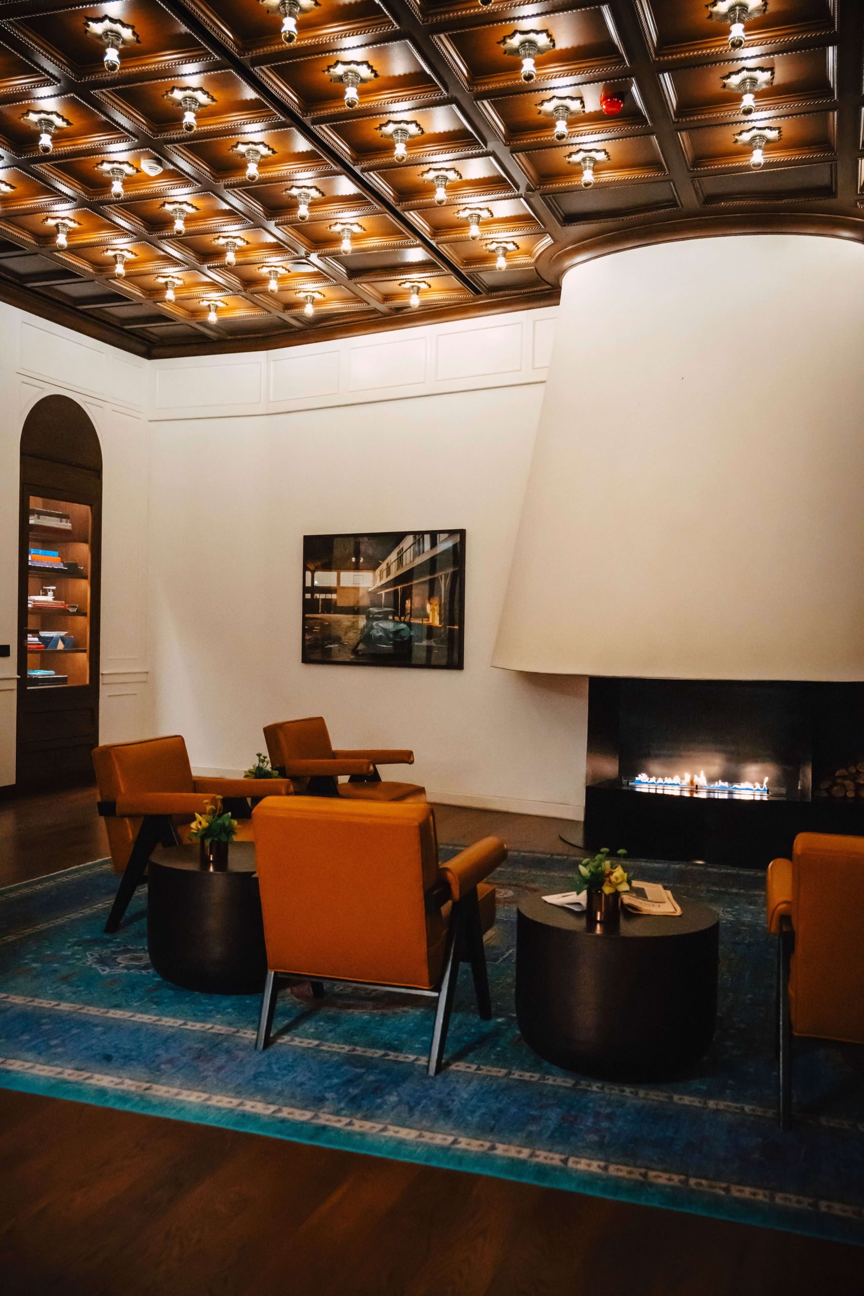 Elegant hotel lounge with fireplace, representing the World of Hyatt and Aeroplan partnership