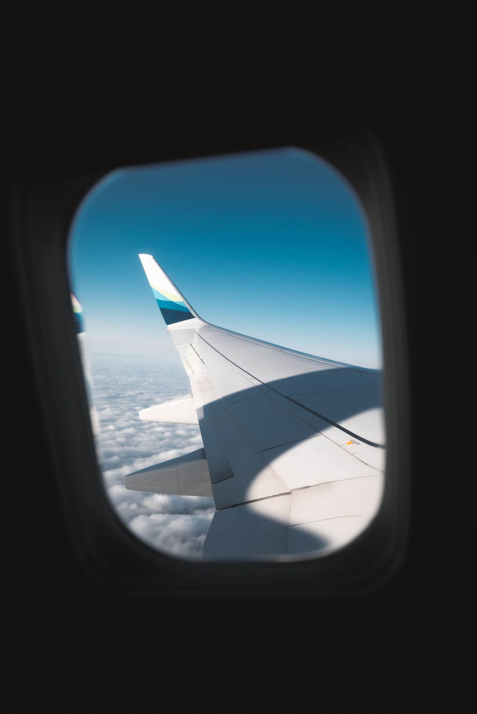 United Gateway Card (With No Annual Fee) Review 15 View of an airplane wing from a window seat above the clouds